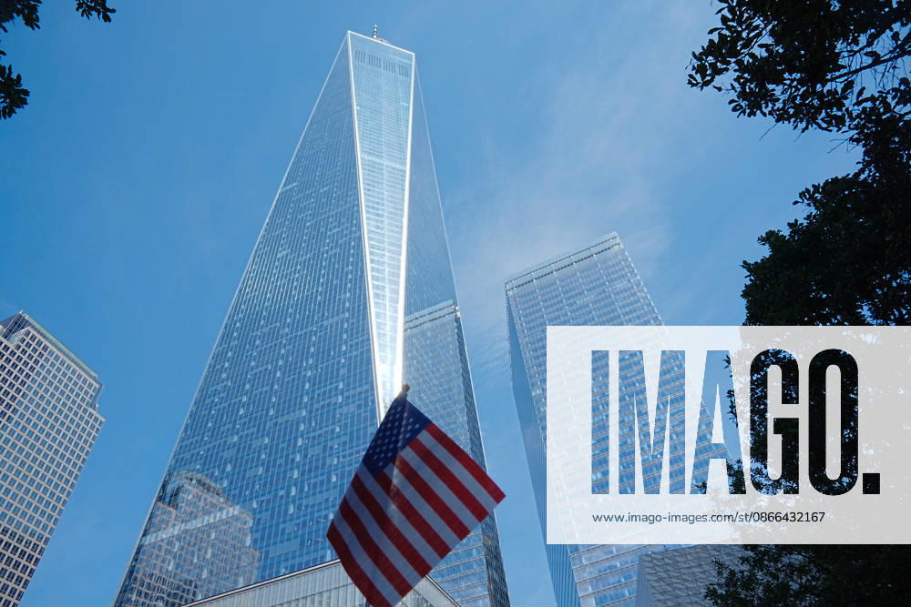 An American flag at the North Tower reflecting pool with One World Trade Center in the background ahead of the 25th anniversary of the attacks of September 11 at the 9 11 Memorial on September 9, 2026 in New York. New York USA - ZUMAb148 20260909_zap_b148_068