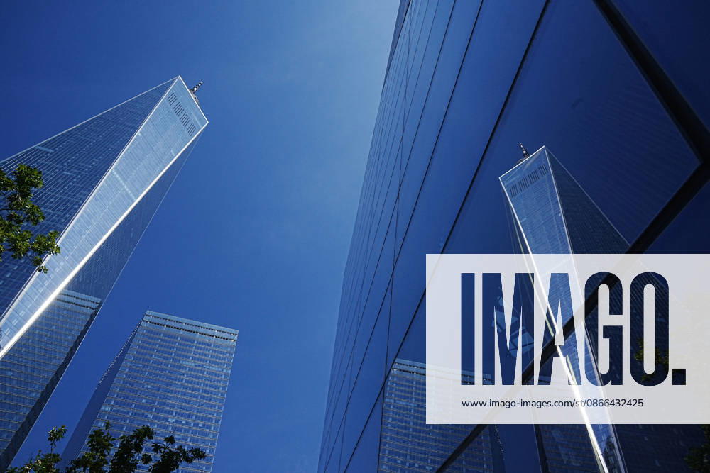 One World Trade Center is reflected ahead of the 25th anniversary of the attacks of September 11 at the 9 11 Memorial on September 9, 2026 in New York. New York USA - ZUMAb148 20260909_zap_b148_076