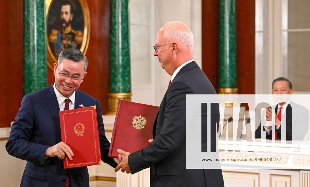 Russia Vietnam 9239838 09.09.2026 Vietnamese Finance Minister Ngo Van Tuan and Russian Direct Investment Fund CEO - Special Presidential Representative for Investment and Economic Cooperation with Foreign Countries Kirill Dmitriev exchange signed documents following a meeting between Russian President Vladimir Putin and Vietnamese President To Lam at the Kremlin in Moscow, Russia. Alexey Maishev Sputnik Moscow Russia