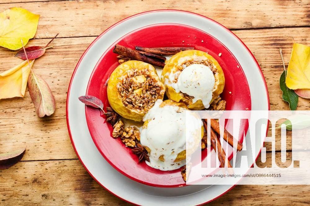Baked apples stuffed with granola and nuts.Baking concept