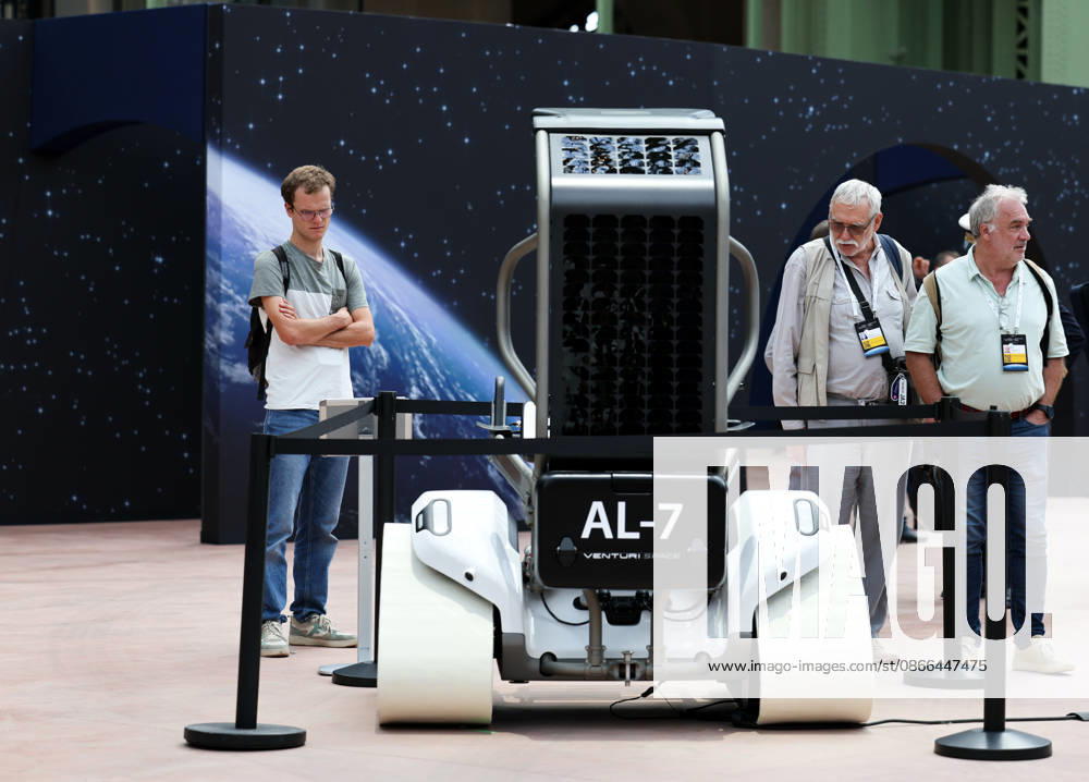 (260909) -- PARIS, Sept. 9, 2026 -- Visitors check an exhibit during the International Space Summit at the Grand Palais in Paris, France, Sept. 9, 2026. The first International Space Summit opened Wednesday in Paris, bringing together heads of state and government, scientists, astronauts and industry representatives. ) FRANCE-PARIS-INTERNATIONAL SPACE SUMMIT WuxHuiwo