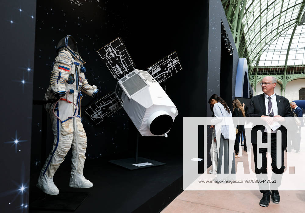 (260909) -- PARIS, Sept. 9, 2026 -- A visitor checks exhibits during the International Space Summit at the Grand Palais in Paris, France, Sept. 9, 2026. The first International Space Summit opened Wednesday in Paris, bringing together heads of state and government, scientists, astronauts and industry representatives. ) FRANCE-PARIS-INTERNATIONAL SPACE SUMMIT WuxHuiwo