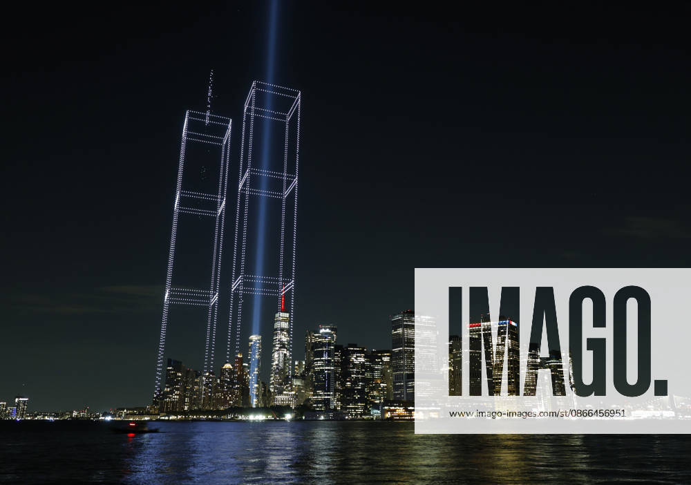 #2 A light installation in the shape of the Twin Towers is illuminated with drones over One World Trade Center and the Manhattan skyline in the days leading up to the 25th anniversary of the 9 11 terrorist attacks on the World Trade Center in New York City on Wednesday, September 9, 2026. A public art installation designed in conjunction with representatives of the family, survivor, responder community was unveiled over New York Harbor, originating from Governor s Island. 2977 Lights Over New York Harbor is a sponsored project of New York Foundation of the Arts. NYP20260909102 JOHNxANGELILLO