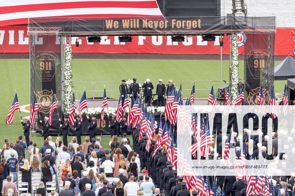 Members of FDNY walked with 343 American flags for each member who sacrificed their live on September 11, 2001 during memorial service to commemorate 25th anniversary of terrorist attack on World Trade Center in New York. Service was held at FerryHawks Stadium of Staten Island Borough, New York, NY on September 9, 2026. FDNY members, families of those how perished on that day and who died after of illnesses related to their work in the rescue and recovery efforts, members of fire departments from around the country as well as firefighters from Italy and France attended the service. Bronx USA - ZUMAr339 20260909_znp_r339_025