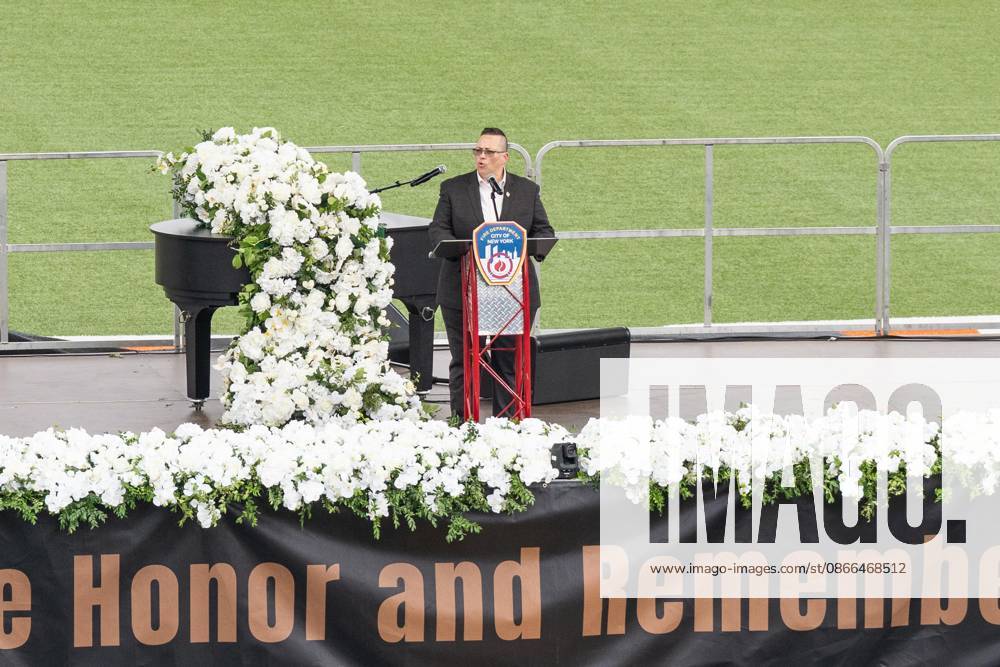 Fire Commissioner Lillian Bonsignore speaks during memorial service to commemorate 25th anniversary of terrorist attack on World Trade Center in New York. Service was held at FerryHawks Stadium of Staten Island Borough, New York, NY on September 9, 2026. FDNY members, families of those how perished on that day and who died after of illnesses related to their work in the rescue and recovery efforts, members of fire departments from around the country as well as firefighters from Italy and France attended the service. New York USA - ZUMAr339 20260909_znp_r339_029