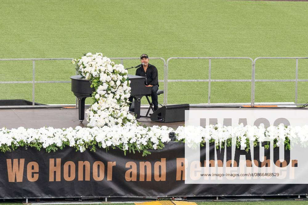 John Ondrasik aka Five for Fighting performs song Superman (It s not Easy) during memorial service to commemorate 25th anniversary of terrorist attack on World Trade Center in New York. Service was held at FerryHawks Stadium of Staten Island Borough, New York, NY on September 9, 2026. FDNY members, families of those how perished on that day and who died after of illnesses related to their work in the rescue and recovery efforts, members of fire departments from around the country as well as firefighters from Italy and France attended the service. New York USA - ZUMAr339 20260909_znp_r339_036