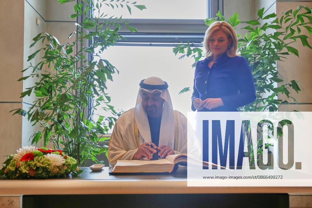 German Bundestag State Visit His Highness Muhammad bin Zayid Al Nahyan, President of the United Arab Emirates, signs the guest book of the German Bundestag, alongside Bundestag President Julia Klöckner (CDU)