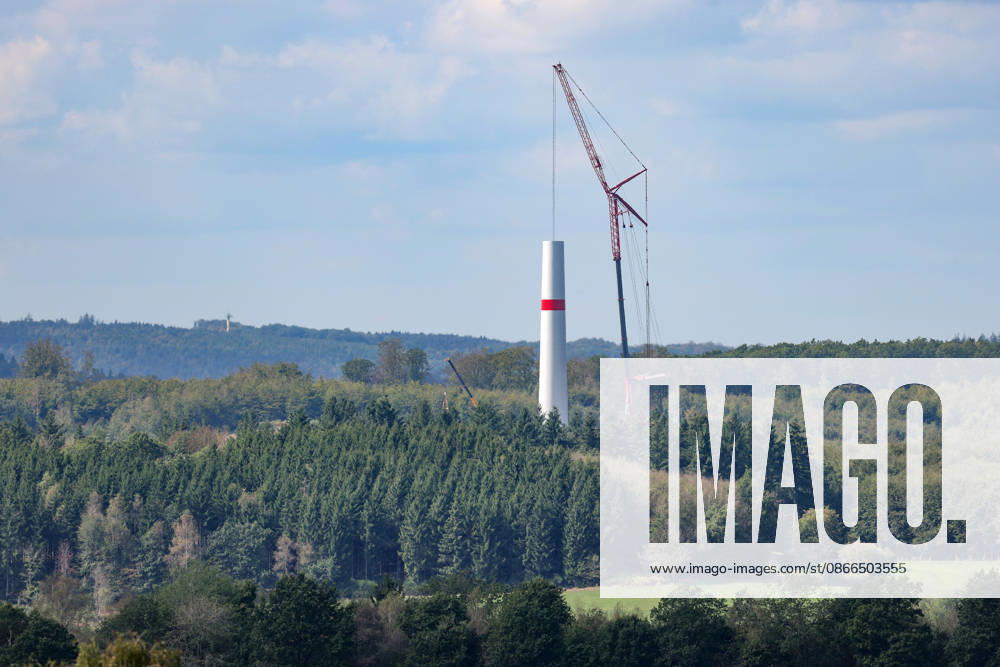 A new wind turbine is being built near Freudenberg. Work is underway. Part of the tower is already in place, and a telescopic crane stands next to it. Wind turbine construction in the Siegerland region on September 10, 2026, in Freudenberg, Germany