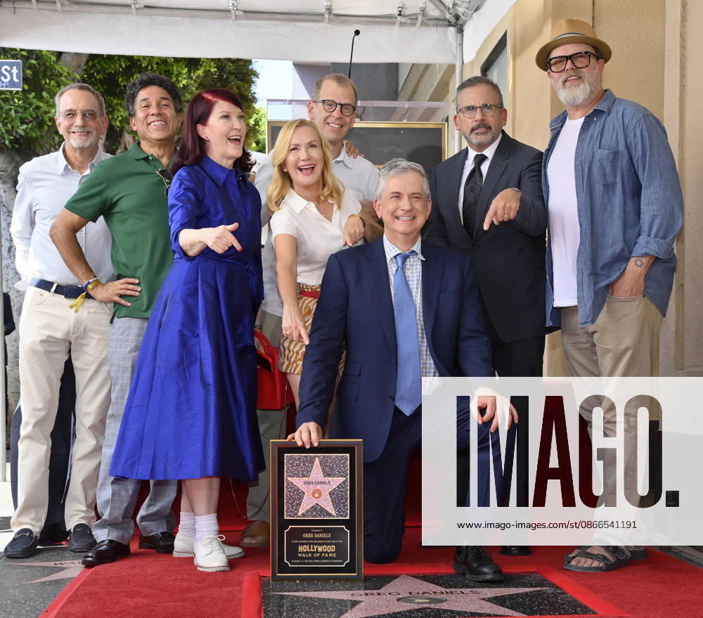 American screenwriter, television producer and director Greg Daniels kneels as he is joined by actors Oscar Nunez, Kate Flannery, Paul Lieberstein, Angela Kinsey, Steve Carell, and Rainn Wilson (L-R) during an unveiling ceremony honoring Daniels with the 2,856th star on the Hollywood Walk of Fame in Los Angeles on Thursday, September 10, 2026. LAP2026091007 JIMxRUYMEN