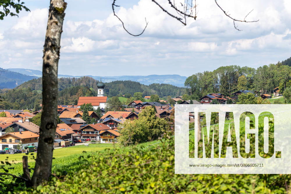 Pleasant September weather: The sun shines down on the countryside, featuring the village of Schöllang, Oberstdorf, Bavaria, Germany