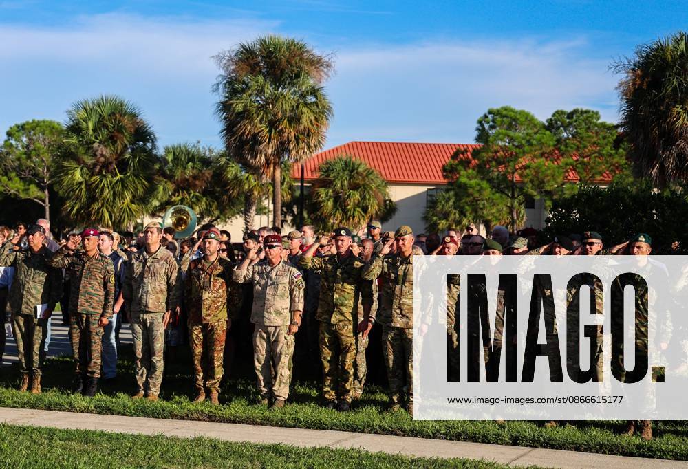 Members of the military community salute during the National Anthem during the 9 11 25th Anniversary Memorial Service hosted by U.S. Special Operations Command (USSOCOM) to honor the 25th anniversary of the Sept. 11 terrorist attacks at the MacDill AFB Special Operations Forces Memorial on Friday, Sept. 11, 2026 in Tampa. Attendees honored the nearly 3,000 victims of the Sept. 11 attacks and reflect on the enduring legacy and resolve of the SOF community. Tampa USA - ZUMAs70_ 20260911_zan_s70_004