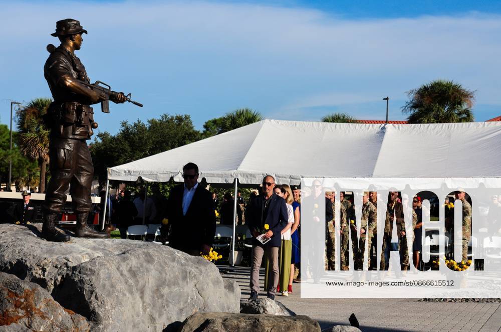 Members of the military community and guests lay flowers at the foot of the memorial during the flower tribute at the end of the 9 11 25th Anniversary Memorial Service hosted by U.S. Special Operations Command (USSOCOM) to honor the 25th anniversary of the Sept. 11 terrorist attacks at the MacDill AFB Special Operations Forces Memorial on Friday, Sept. 11, 2026 in Tampa. Tampa USA - ZUMAs70_ 20260911_zan_s70_010