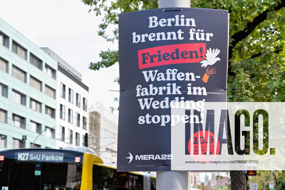Berlin, September 11, 2026: An election poster from the MERA25 party calling for a halt to the weapons factory in Wedding hangs on a pole in Berlin; in the background is an M27 bus. Poster opposing a weapons factory in Wedding for the Berlin election