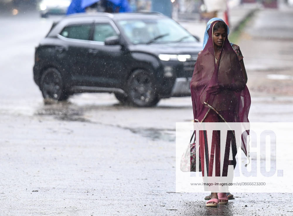 Commuters pass through a road in Sector 47 during light rain, on September 11, 2026 in Noida, India. (Photo by Sunil Ghosh Hindustan Times ) Heavy Rain Lashes Delhi-NCR
