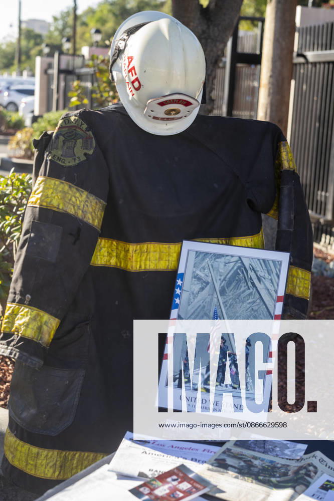 A firefighterâ€⠢s uniform and an iconic photograph of the 9 11 flag-raising are displayed as the Los Angeles Fire Department marks the 25th anniversary of the terrorist attacks on Sept. 11, 2026, at the Frank Hotchkin Memorial Training Center in Los Angeles, California. Los Angeles USA - ZUMAc68_ 20260911_zaf_c68_002