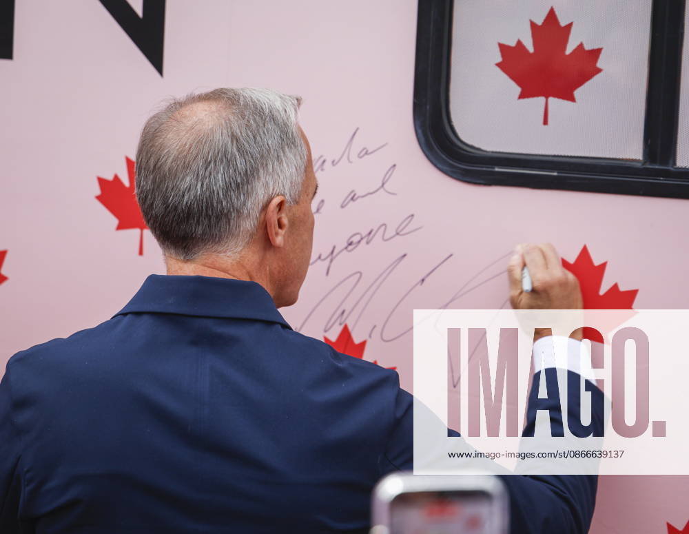 Prime Minister Mark Carney signs the Forever Canadian bus following a cabinet retreat in Banff, Alta., Friday, Sept. 11, 2026. Banff CANADA - ZUMAc35_ 20260911_zaf_c35_087