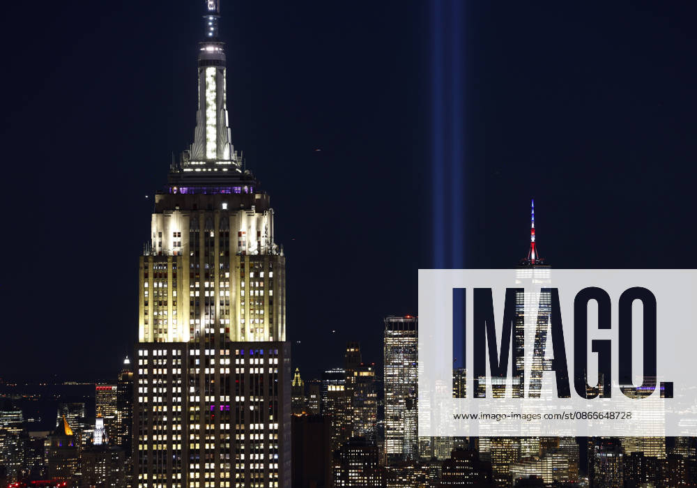 #2 The Twin Towers Tribute In Light art installation is illuminated in Lower Manhattan behind One World Trade Center and the Empire State Building as viewed from The Top Of The Rock Observation Deck in Rockefeller Center on the 25th anniversary of the 9 11 terrorist attacks on the World Trade Center in New York City on Friday, September 11, 2026. NYP202609112004 JOHNxANGELILLO