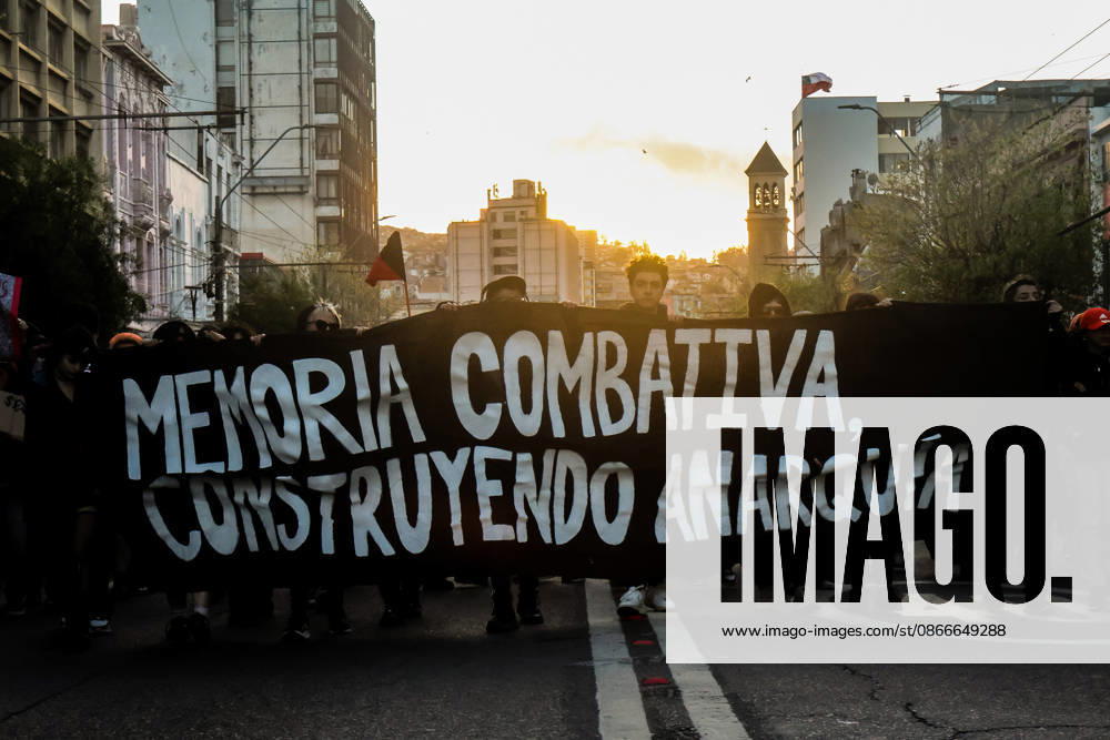 Demonstration march in commemoration of the 53rd anniversary of the coup d Ètat in ValparaÌso, Chile - 9 Sept 2026 Protesters carry a banner expressing their opinion during a demonstration march commemorating the 53rd anniversary of the coup d Ètat in ValparaÌso. Valparaiso Chile