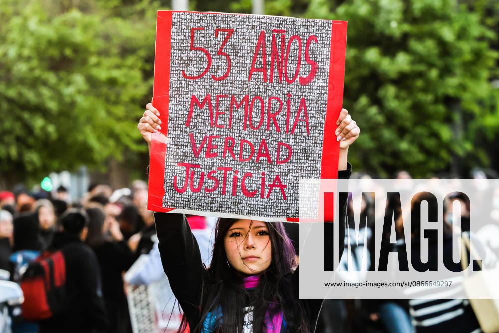 Demonstration march in commemoration of the 53rd anniversary of the coup d Ètat in ValparaÌso, Chile - 9 Sept 2026 A protester holds a placard expressing her opinion during a demonstration march commemorating the 53rd anniversary of the coup d Ètat in ValparaÌso. Valparaiso Chile