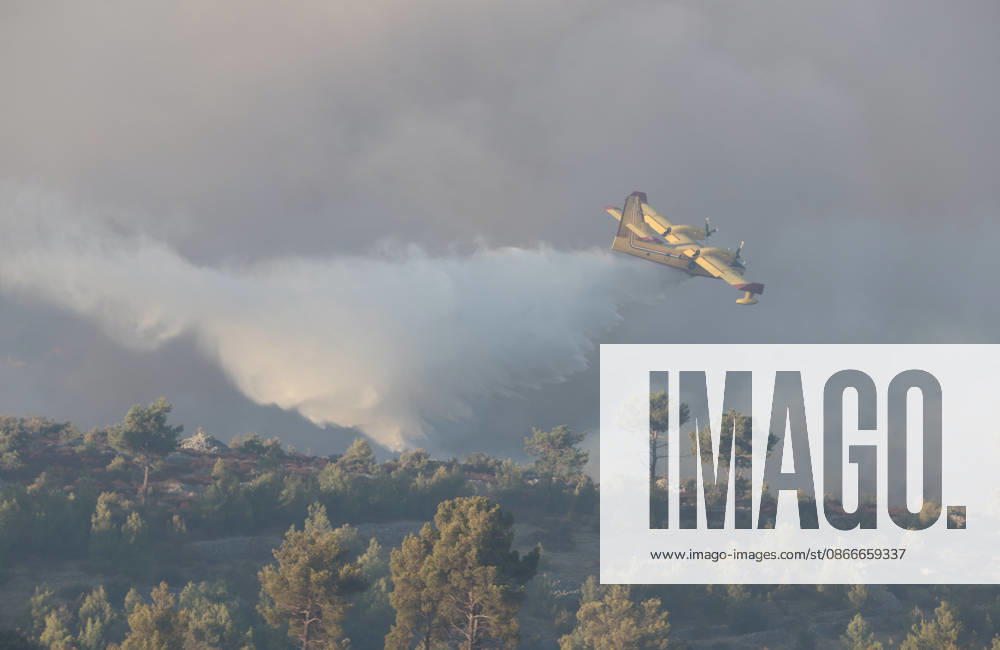 Croatia Island Wildfire A Croatian Canadair CL-415 firefighting plane drops water on a wildfire near city Milna at Island Brac, Croatia on September 12, 2026. IvoxCagalj PIXSELL