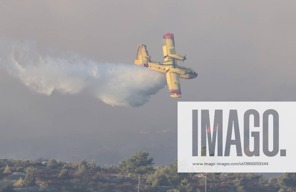 Croatia Island Wildfire A Croatian Canadair CL-415 firefighting plane drops water on a wildfire near city Milna at Island Brac, Croatia on September 12, 2026. IvoxCagalj PIXSELL