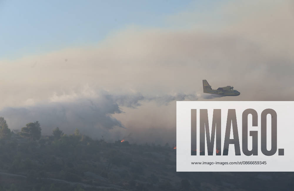 Croatia Island Wildfire A Croatian Canadair CL-415 firefighting plane drops water on a wildfire near city Milna at Island Brac, Croatia on September 12, 2026. IvoxCagalj PIXSELL