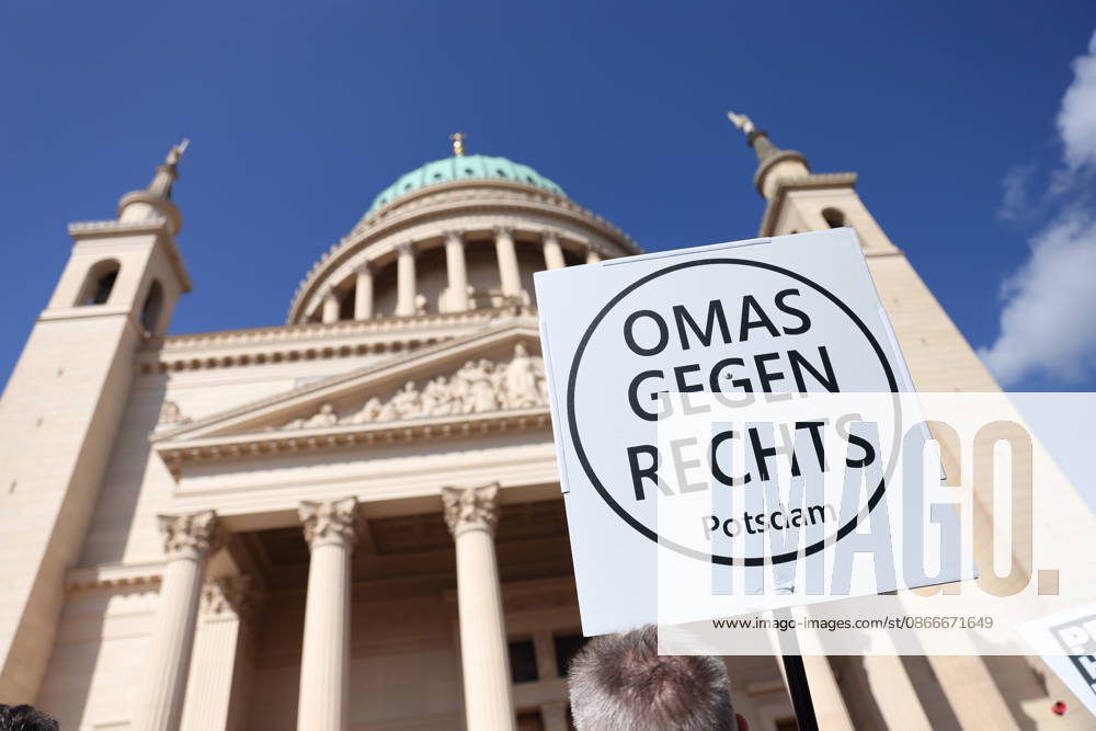 A protester holding a sign reading Grandmas Against the Right Potsdam during a demonstration calling for the Federal Constitutional Court to review far-right parties, Alter Markt, Potsdam, September 12, 2026: Protest in Potsdam