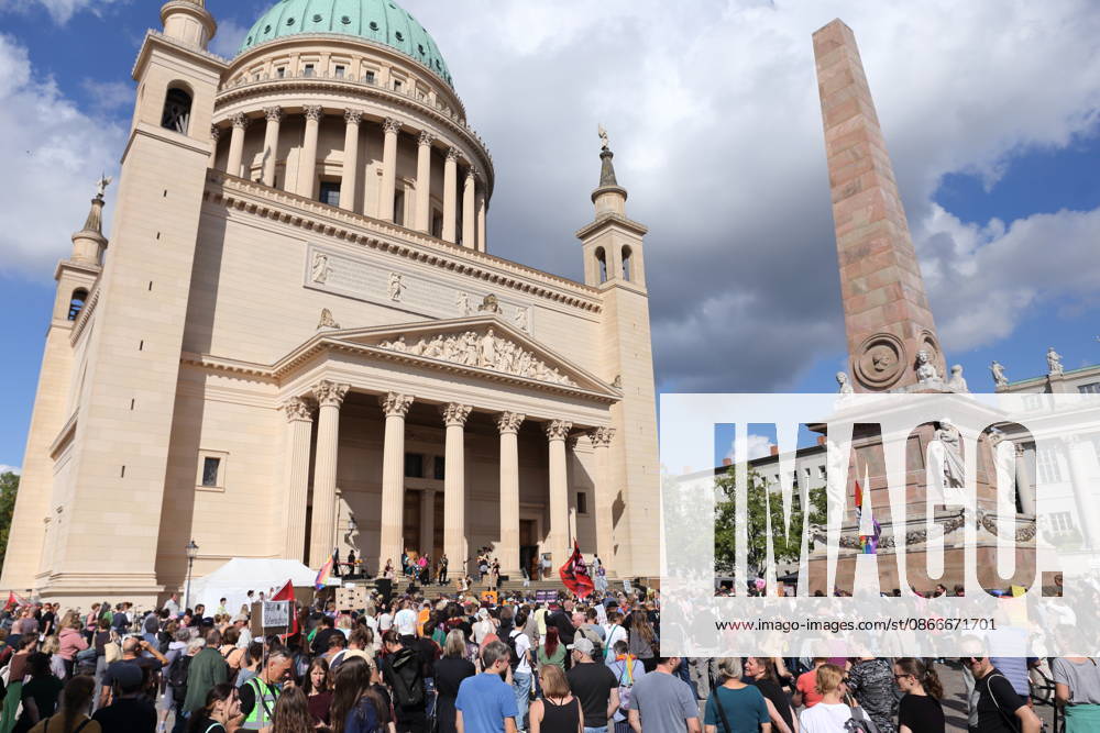 Protesters in front of St. Nicholas Church during a demonstration calling for the Federal Constitutional Court to review far-right parties, Alter Markt, Potsdam, September 12, 2026 Protest in Potsdam