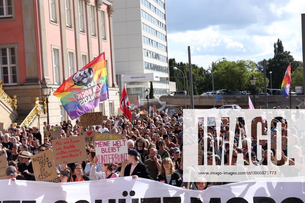 Protesters carrying a banner reading Review today, Schütz tomorrow march around the state parliament during a demonstration calling for the Federal Constitutional Court to review far-right parties, Alter Markt, Potsdam, September 12, 2026. Review demonstration in Potsdam