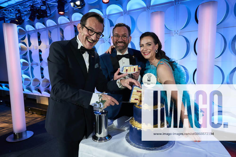 2026 German Acting Award: Hans Werner Meyer, Nadine Heidenreich, and Christian Senger cut the cake on stage at the show celebrating 15 years of the German Acting Award and 20 years of the BFFS, Pullman Berlin Schweizerhof