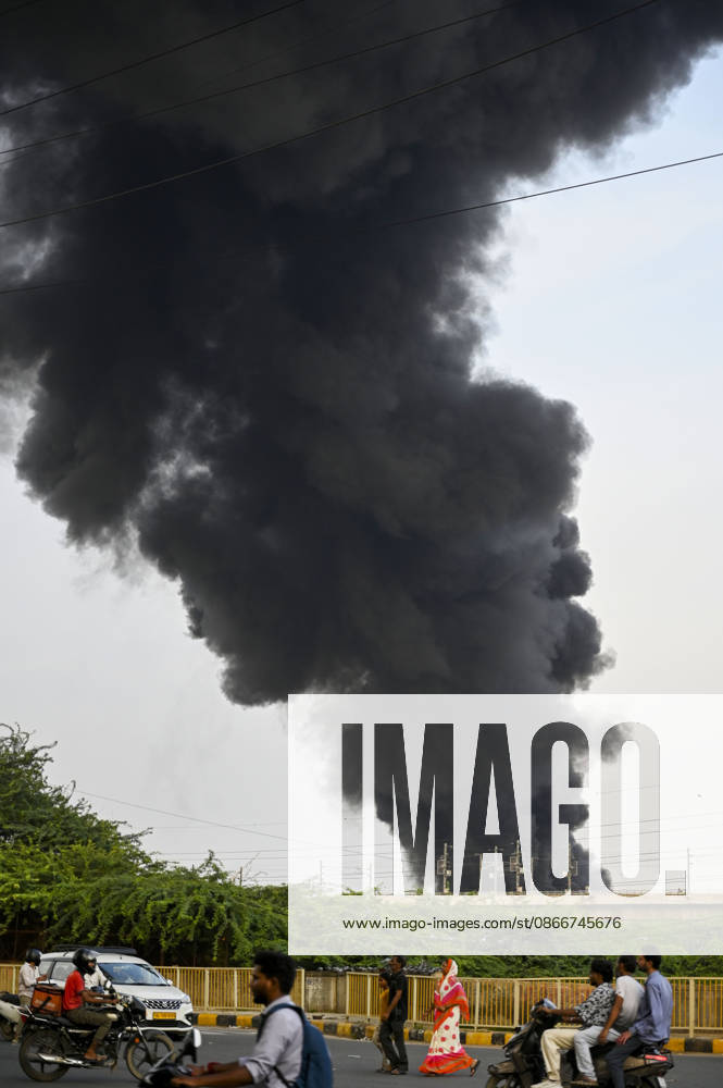 A fire breaks out at a plywood warehouse in Dallupura, East Delhi, sending thick smoke into the sky that is visible from several kilometres away, on September 13, 2026 in New Delhi, India. The fire department received a call about the blaze at 3.20 pm, following which 12 fire tenders were rushed to the spot. Firefighters were present at the site and were working to control the blaze. (Photo by Sanjeev Verma Hindustan Times ) Massive Fire Breaks Out At Delhi Plywood Warehouse, 12 Fire Tenders Rushed