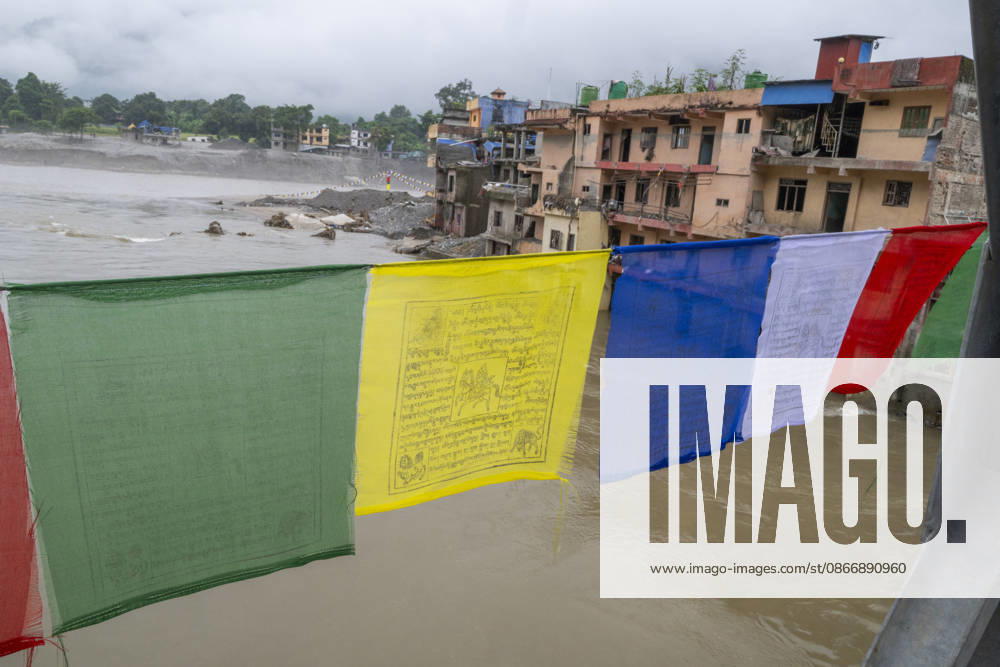 Aftermath of the devastating flash floods in Nepal NUWAKOT, NEPAL - SEPTEMBER 15: A view of the submerged landscape following the devastating flash floods on August 26 that struck Devighat, Nuwakot, Nepal, on September 15, 2026. People in the affected areas of Nuwakot continue to return in search of their destroyed homes and the last remaining memories of their lives. Some are trying to recover essential belongings from the rubble, while others are working with family members to remove soil from parts of their homes buried underground and make them habitable again. The destruction in Devighat village is severe. Many multi-storey buildings have collapsed, while some have been buried under earth up to the level of their fifth floors. Religiou