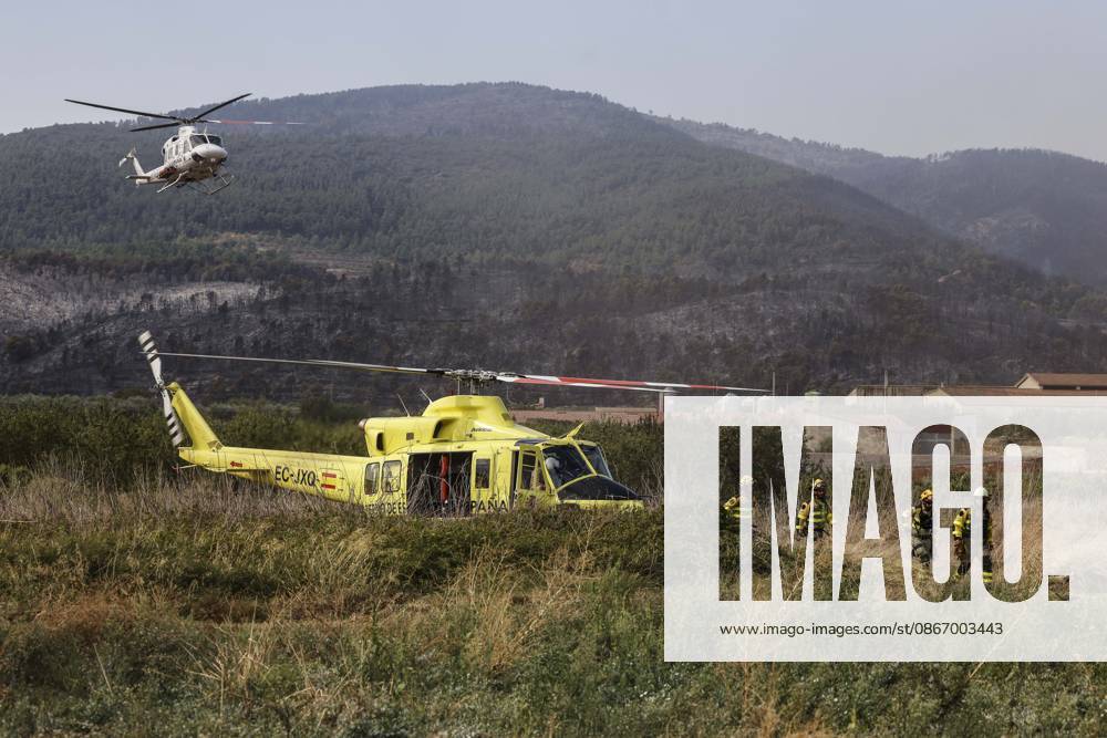 The Tuéjar fire has burned 880 hectares, and efforts are focused on preventing it from crossing the reservoir ahead of the storm. A helicopter is assisting in the efforts to extinguish the wildfire, on September 16, 2026, in Tuéjar, Valencia, Valencian Community, Spain. The fire, which broke out on the afternoon of Tuesday, September 15, in the Valencian town of Tuéjar, has evolved favorably overnight, but it remains active, and efforts are now focused on preventing it from spreading west of the reservoir as authorities monitor the storm expected this afternoon and the changing wind conditions, which may be erratic with gusts ranging from 50 to 80 kilometers per hour SEPTEMBER 16, 2026 Tuéjar, Valencia, Valencian Community Tuéjar, Valencia