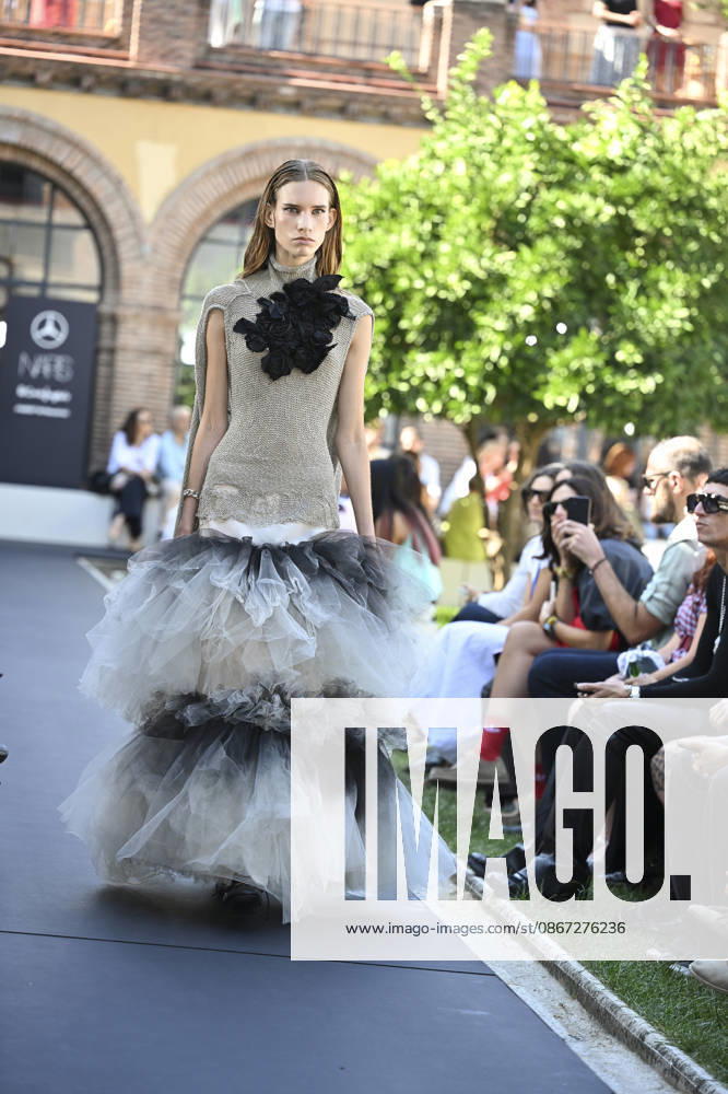 Apo Biyeyemete - Mercedes Benz Fashion Week Madrid, Spain - 19 Sep 2026 A model parades with Apo Biyeyemete a design during the Mercedes Benz Fashion Week Madrid at Cibeles Palace in Madrid. Madrid Spain