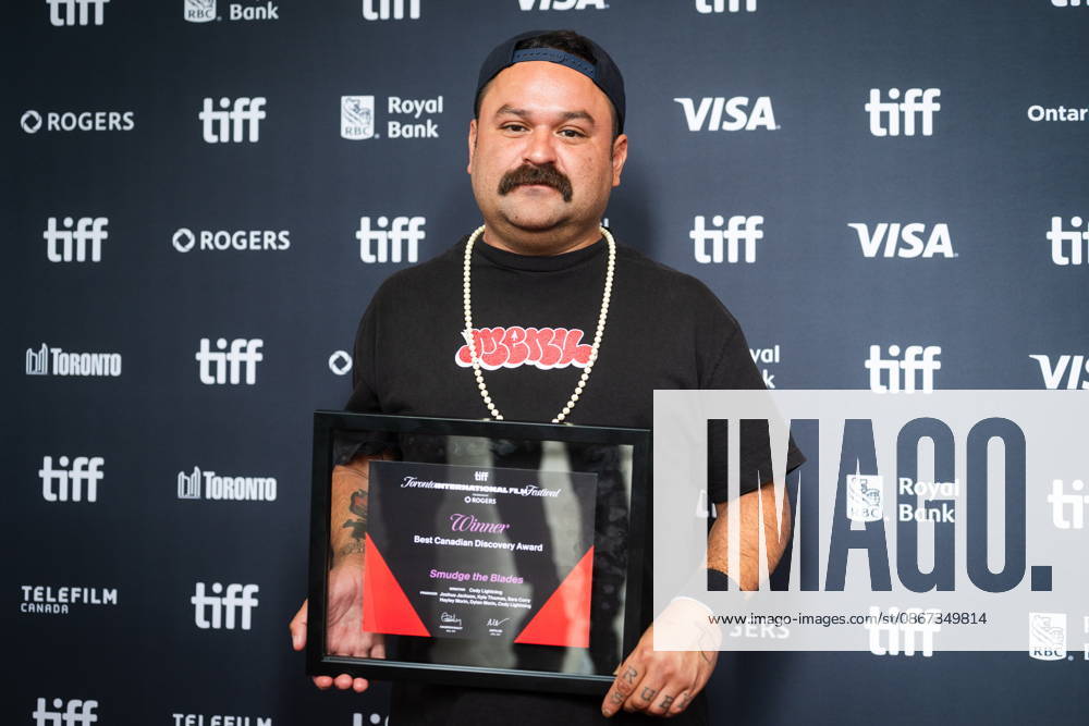 Cody Lightning holds his Best Canadian Discovery Award for Smudge the Blades after the TIFF Awards at the Toronto International Film Festival in Toronto, on Sunday, Sept. 20, 2026. Toronto Canada - ZUMAc35_ 20260920_zaf_c35_062
