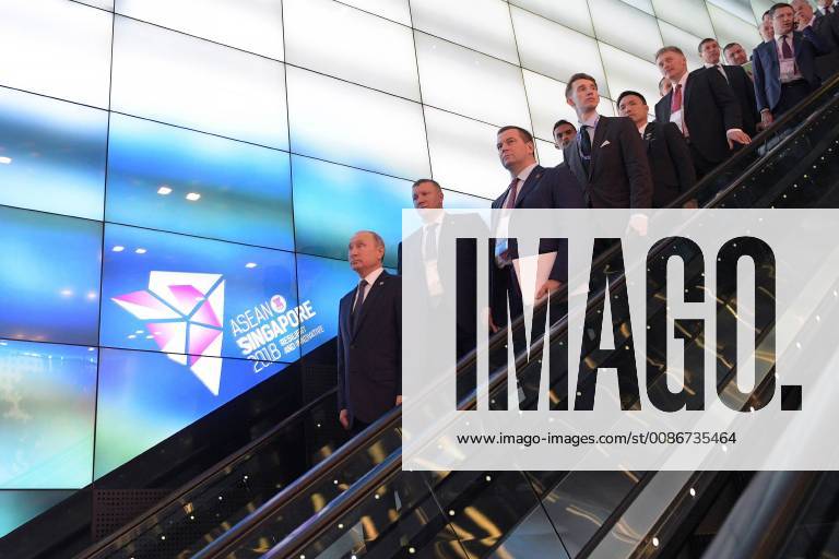SINGAPORE – NOVEMBER 14, 2018: Russia s President Vladimir Putin (L), Russia s Energy Minister Alexander Novak, and Putin s spokesman Dmitry Peskov (R-L) attend a Russia-ASEAN summit. Alexei Druzhinin Russian Presidential Press and Information Office TASS TS09756F