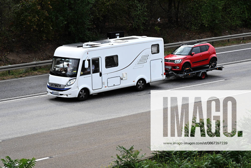 Economy, emwir, Hymer, Hymermobil motorhome with trailer, trailer, on the A5 highway (stock photo), stock image, Zeppelinheim