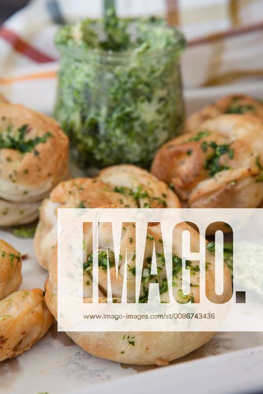 Hearty pastry made of puff pastry with herb butter Savoury puff pastry snack 1079705260