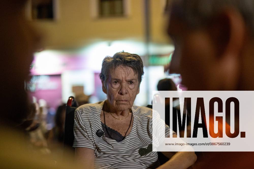 Maricarmen attends an event organized by housing activists the day before her scheduled eviction from her home in Madrid..A rally held under the slogan Maricarmen Stays. The eviction of MaricarmenÃ¢â‚¬an 87-year-old resident of MadridÃ¢â‚¬â ¢s Retiro neighborhoodÃ¢â‚¬is currently on temporary hold while the Tenants Union and local residents mobilize to prevent her ousting by a real estate investment fund. Madrid Spain - ZUMAs197 20260922_aaa_s197_199