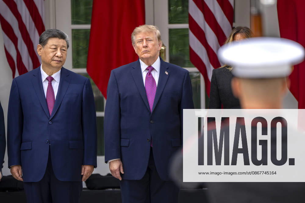 Chinese President Xi Jinping and President Donald Trump watch as the U.S. Army Drill Team passes in review during a state visit welcoming ceremony at the White House in Washington DC on Thursday, September 24, 2026. Xi is on a three-day state visit to the U.S. and will hold talks with U.S. officials on tariffs, AI, and other issues. WAP20260924712a BONNIExCASH