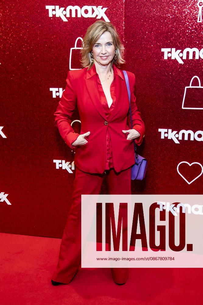 ABB TKMAXX Tina Ruland in a red pantsuit on the red carpet at the grand reopening of the TK Maxx store on Alexanderplatz on September 24, 2026, in Berlin, Germany