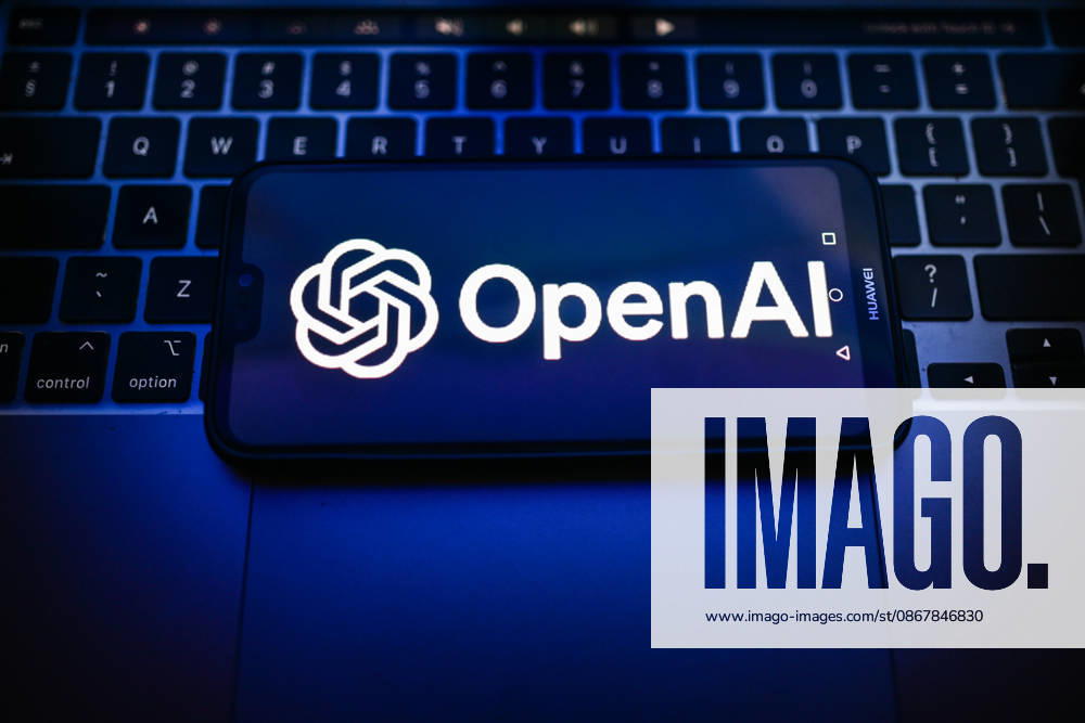 Tech illustrations in Poland - 25 Sept 2026 In this photo illustration, an OpenAI logo is seen displayed on a smartphone on the top of a laptop. Poland