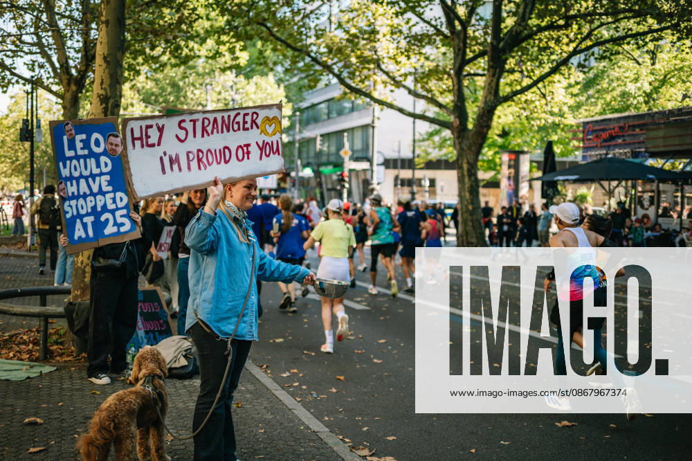 Highlights from the 52nd BMW BERLIN MARATHON on September 27, 2026, in Berlin: Runners on the marathon course and spectators lining the route of the 2026 BMW Berlin Marathon