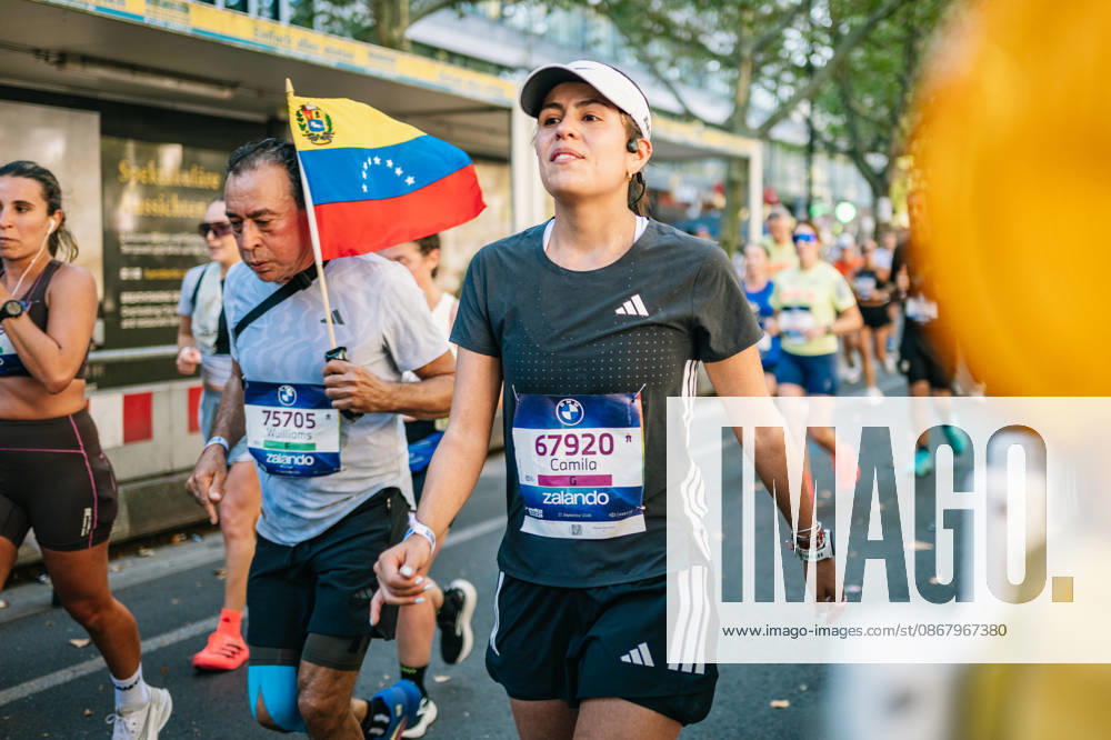 Highlights from the 52nd BMW BERLIN MARATHON on September 27, 2026, in Berlin: Runners on the marathon course and spectators lining the route of the 2026 BMW Berlin Marathon