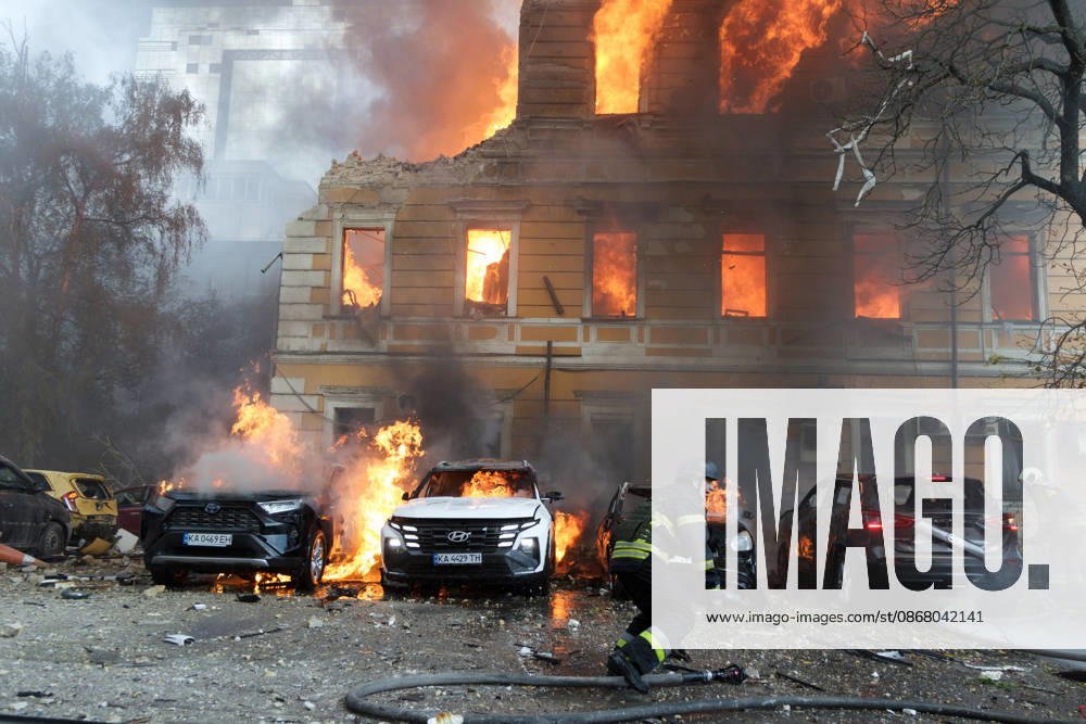 Rescuers pour water on burning cars and the National Academy of Sciences building, which is engulfed in flames after being hit by a Russian drone, Kyiv, Ukraine, September 28, 2026. One person was killed, and three others were injured in the attack. (Photo by Kyrylo Chubotin Ukrinform) Russian drone strikes Ukrainian National Academy of Sciences building in KyivRussian drone strikes Ukrainian National Academy of Sciences building in Kyiv