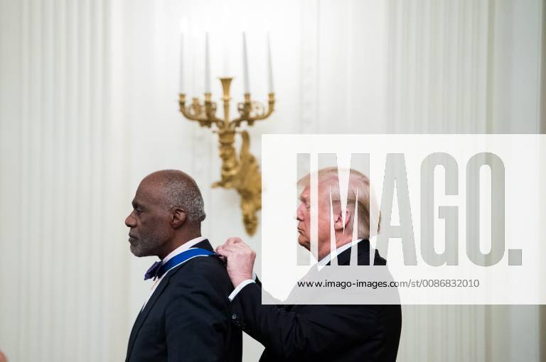 President Donald Trump awards the Medal of Freedom to Alan Page, football great and Minnesota Supreme Court justice, during a ceremony at the White House in Washington, D.C. on November 16, 2018. WAP20181116326 KEVINxDIETSCH