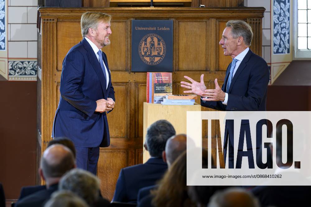 Leiden, The Netherlands, 2026-10-02 11:59:26 LEIDEN, 02-10-2026, Leiden University. King Willem Alexander receives the results of the independent research into the role of the House of Orange-Nassau in the colonial history of the Netherlands in the Academy Building of Leiden University. Principal investigator Prof. Dr. Gert Oostindie presents the King with the five books on which approximately sixty researchers have worked over the past few years, including the comprehensive popular book *Oranje en de Koloniën, 1600-2025. De kolonie geschiedenis van het Huis Oranje-Nassau*. PHOTO: NLBeeld Patrick van Emst Credit: NL Beeld Patrick van Emst