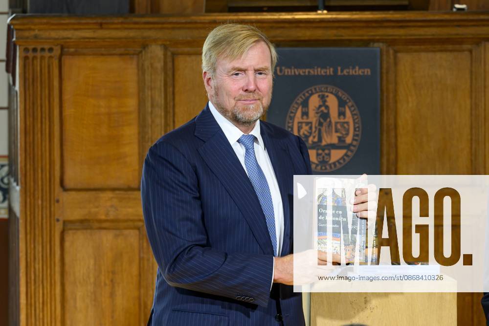 Leiden, The Netherlands, 2026-10-02 11:59:33 LEIDEN, 02-10-2026, Leiden University. King Willem Alexander receives the results of the independent research into the role of the House of Orange-Nassau in the colonial history of the Netherlands in the Academy Building of Leiden University. Principal investigator Prof. Dr. Gert Oostindie presents the King with the five books on which approximately sixty researchers have worked over the past few years, including the comprehensive popular book *Oranje en de Koloniën, 1600-2025. De kolonie geschiedenis van het Huis Oranje-Nassau*. PHOTO: NLBeeld Patrick van Emst Credit: NL Beeld Patrick van Emst