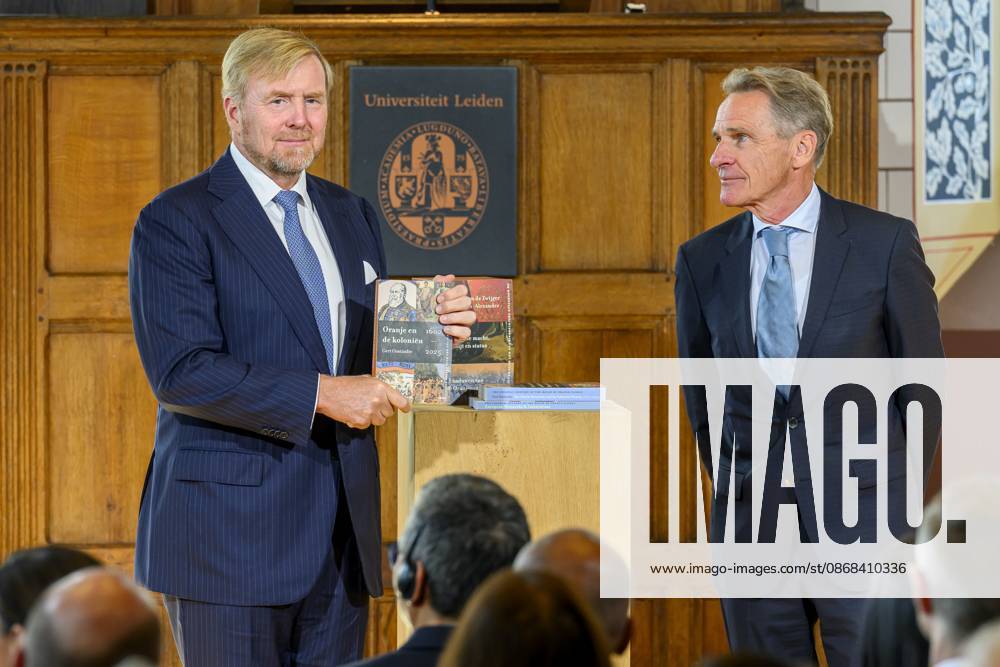 Leiden, The Netherlands, 2026-10-02 11:59:37 LEIDEN, 02-10-2026, Leiden University. King Willem Alexander receives the results of the independent research into the role of the House of Orange-Nassau in the colonial history of the Netherlands in the Academy Building of Leiden University. Principal investigator Prof. Dr. Gert Oostindie presents the King with the five books on which approximately sixty researchers have worked over the past few years, including the comprehensive popular book *Oranje en de Koloniën, 1600-2025. De kolonie geschiedenis van het Huis Oranje-Nassau*. PHOTO: NLBeeld Patrick van Emst Credit: NL Beeld Patrick van Emst