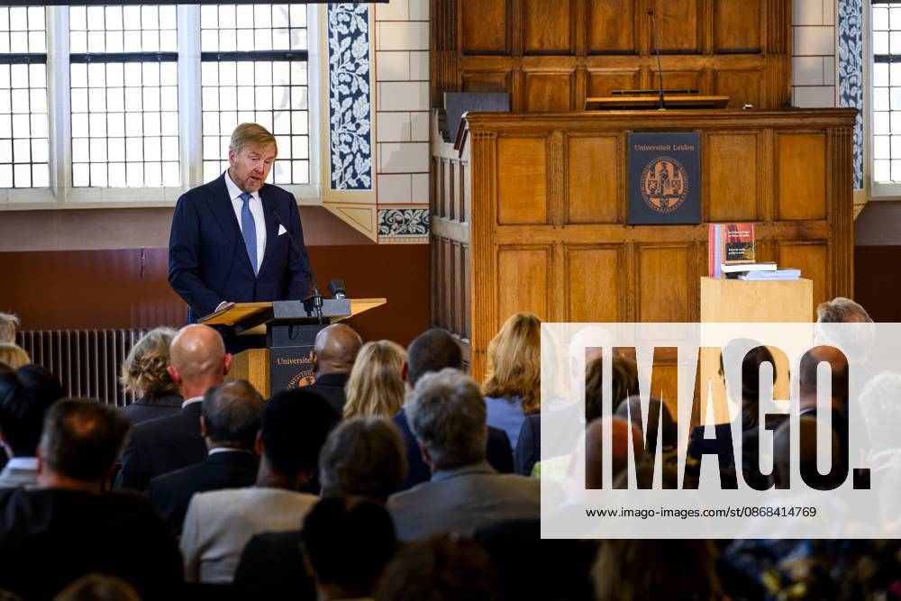 Leiden, The Netherlands, 2026-10-02 12:04:08 LEIDEN, 02-10-2026, Leiden University. King Willem Alexander receives the results of the independent research into the role of the House of Orange-Nassau in the colonial history of the Netherlands in the Academy Building of Leiden University. Principal investigator Prof. Dr. Gert Oostindie presents the King with the five books on which approximately sixty researchers have worked over the past few years, including the comprehensive popular book *Oranje en de Koloniën, 1600-2025. De kolonie geschiedenis van het Huis Oranje-Nassau*. PHOTO: NLBeeld Patrick van Emst Credit: NL Beeld Patrick van Emst